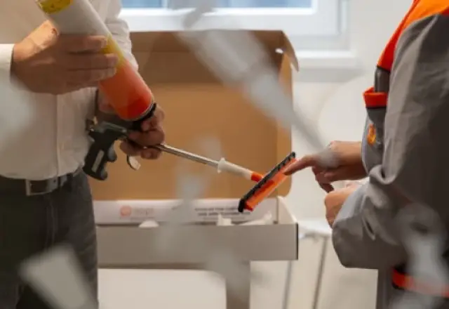 Adhesive spreader